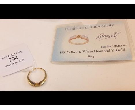 A yellow diamond and white diamond dress ring in 18ct gold setting - with Certificate 