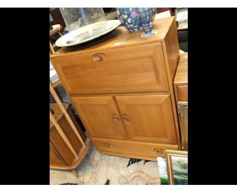 An Ercol Golden Dawn bureau with cupboard under - width 82cmsCONDITION REPORTDimensions are as follows - Height, 100cmWidth, 