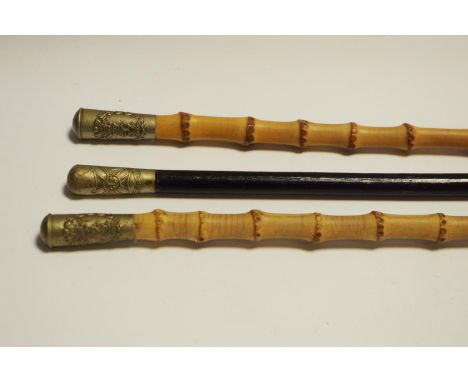 Two WWI Middlesex Regiment swagger sticks with bamboo shafts, silver plated terminal embossed in relief; a 'CLB Junior Traini