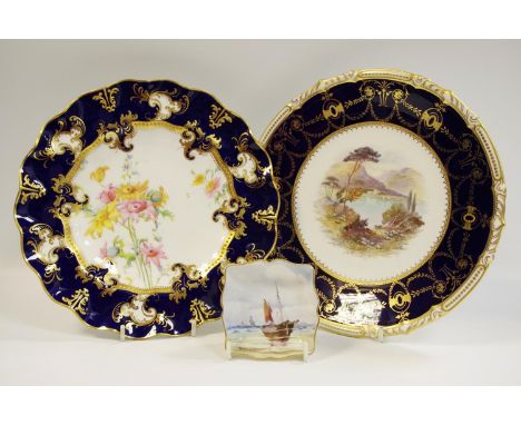 A Royal Crown Derby plate Kilchurn Castle, Loch Awe, Scotland painted by Cuthbert Gresley, signed under raised gilt and cobal