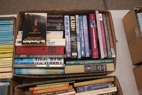 A collection of WW2 military history, paperback military novels, and others