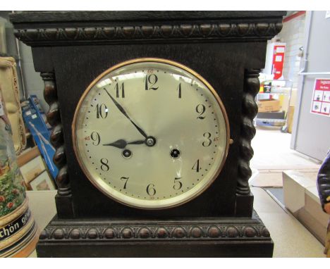 A mantel clock with Junghans B20 movement, chiming on the hour and half hour, includes pendulum and key