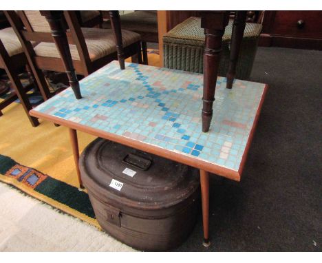 A 1960s tile top coffee table with splayed legs, 42cm high x 67cm long
