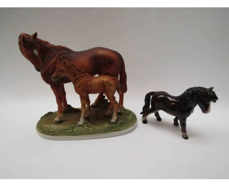 A Kowa porcelain figural group of a horse and foal together with a Goebel Shetland foal