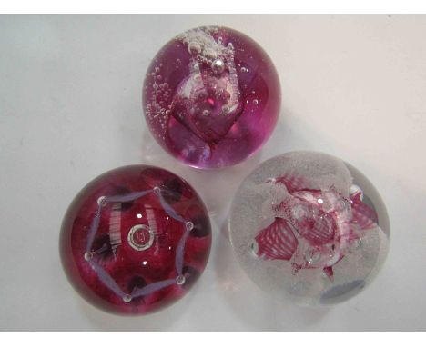 Three Caithness paperweights