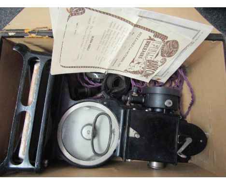 A bygone Eumig P8 screen projector in original box with various Ilford special rapid glass plates together with a Baby Cine p