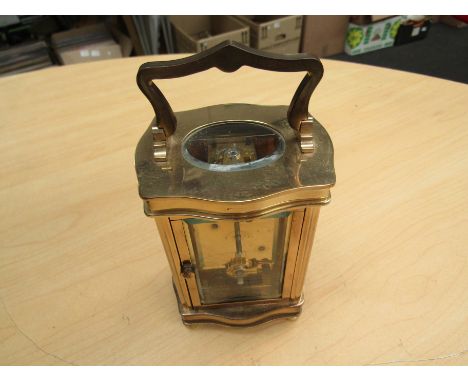 A Henley brass cased carriage clock with Roman numeral dial