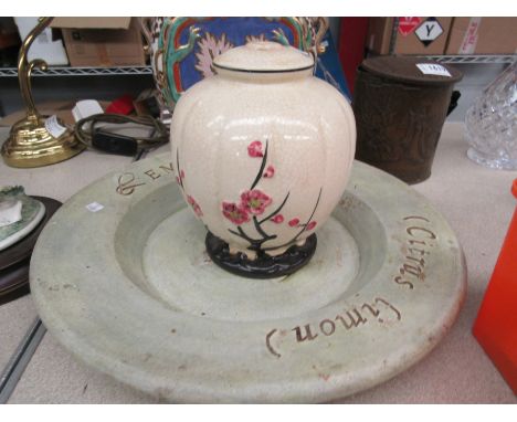 A shallow form bowl/charger marked at rim "Citrus Limon", a 1930's ceramic lamp base and an Oriental style twin handled moon 