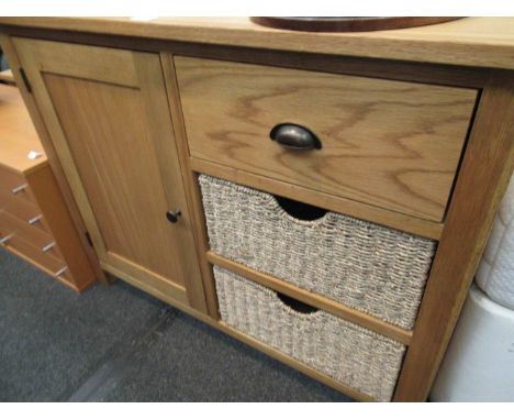 A modern light oak sideboard, single cupboard and three drawers, 100cm wide x 78cm high x 34cm deep