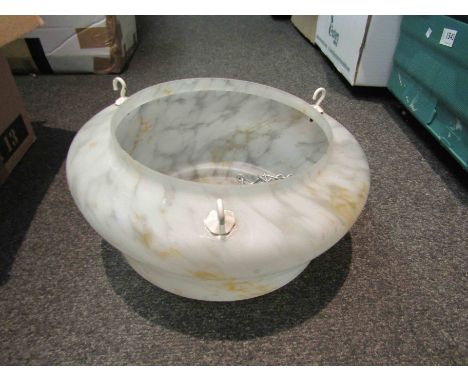 A vintage mottled glass ceiling light shade with hooks