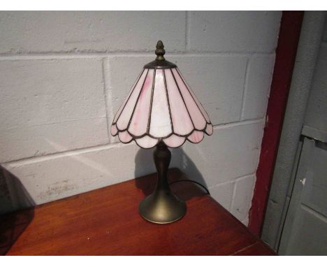 A Tiffany style table lamp with rose pink glass shade, 37cm tall