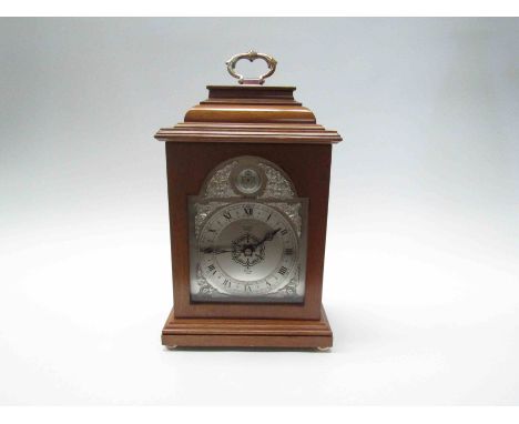 An Elliott Silver Jubilee bracket clock, the mahogany case with arched silvered dial inscribed Pailthorp, Grimsby with ER 195