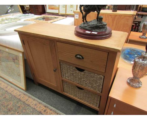 A modern light oak sideboard, single door and three drawers, 100cm wide x 78cm high x 34cm deep