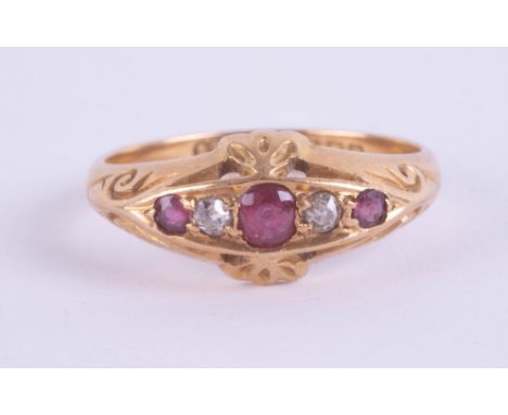 An 18ct antique ruby and diamond five stone ring, 3.7g, size N/O.