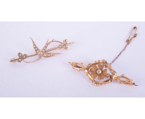 Two gold and diamond set brooches, including flowered design and swift bird design set with seed pearl.