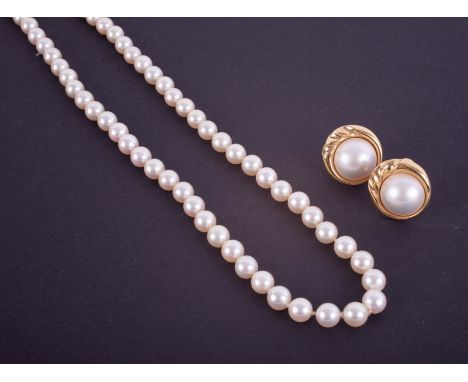 A pair of 9ct pearl earrings set in yellow gold, together with a pearl necklace with a 9ct clasp, length 50cm.