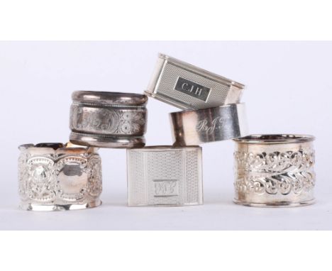 Harlequin set 6 silver hallmarked fancy napkin rings with embossed and engine turned decoration, approximate total weight: 5.