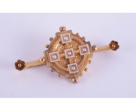 A Victorian yellow metal and seed pearl target brooch with pendant hinge in original box marked Hartley and Haywood, London.