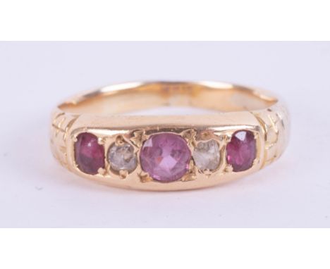 An antique ruby and diamond five stone ring, size O.