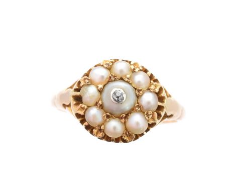 A Victorian split pearl & diamond cluster ring, the principal split pearl inset with old cut diamond, within a split pearl su