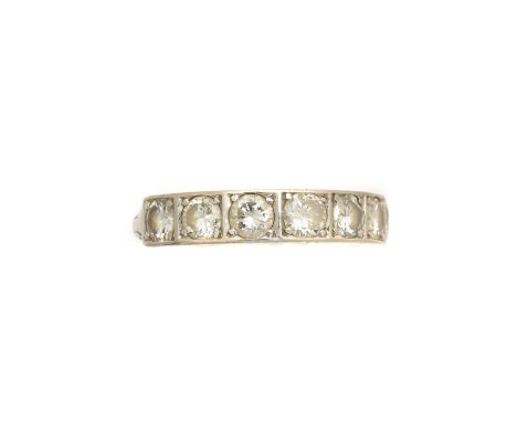 A diamond band ring, the brilliant cut diamond line with hinged polished reverse, estimated total diamond weight 1.60cts, est