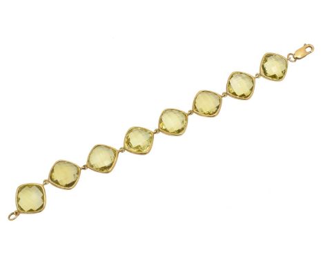A prasiolite bracelet, the cushion shape prasiolite line with a spring clasp, stamped 375, length 19.5cm, gross weight 26.7g.