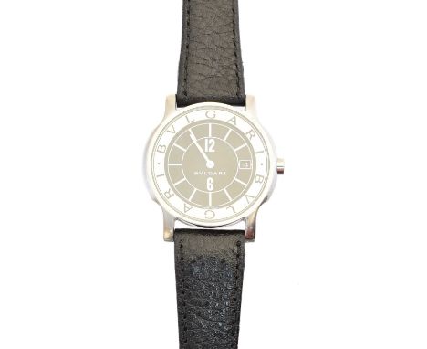 A stainless steel Bulgari Solotempo quartz watch, the circular black signed dial with grid hour markers, date aperture to 3 a