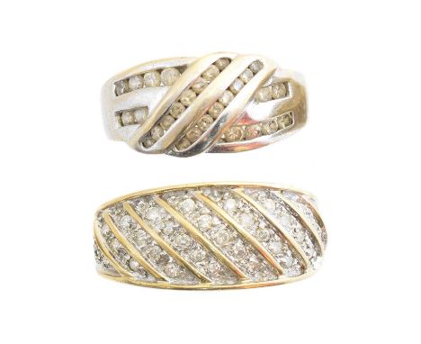 Two 9ct gold diamond band rings, one with crossover detailing and the other with raised bar spacers, estimated total diamond 