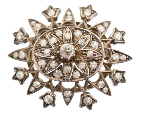 A 19th century diamond brooch, the old-cut diamond within a vari-cut diamond openwork surround, estimated total diamond weigh