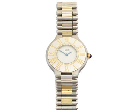 A ladies Must de Cartier quartz watch, the circular signed dial with oversized bi-colour bezel, roman numeral hour markers an