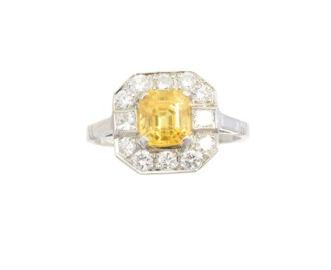 A sapphire and diamond cluster ring, the square shape yellow sapphire with square shape diamond sides and brilliant cut diamo