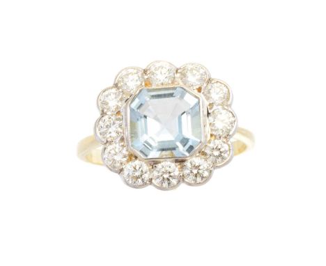 An aquamarine and diamond cluster ring, the square shape aquamarine weighing approx. 1.20cts within a brilliant cut diamond s