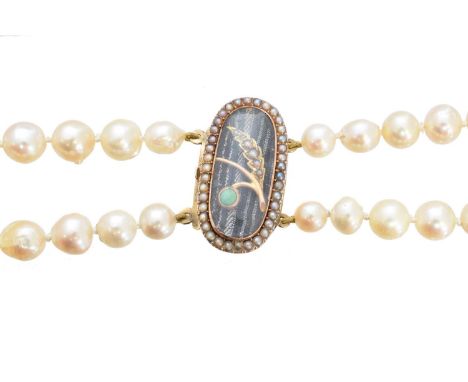 A cultured pearl necklace, the double strand of uniform cultured pearls, with a split pearl and turquoise push piece clasp, l