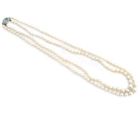 A cultured pearl zircon and diamond necklace, the double row of graduated cultured pearls with an oval shape zircon and singl