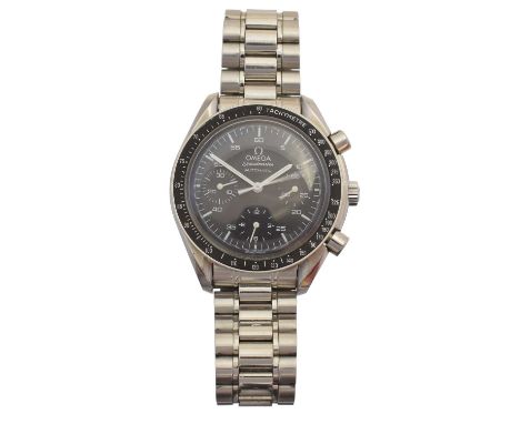 A stainless steel Omega Speedmaster automatic wristwatch, cal. 3220, the black signed dial with three subsidiary dials, lumin