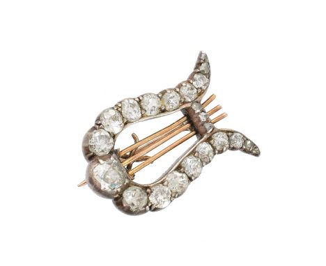 A Victorian diamond lyre brooch, of typical form, set with vari-size old and rose cut diamonds, estimated total diamond weigh
