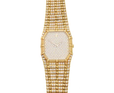 An 18ct gold diamond Audemars Piguet wristwatch, ref C12337, the full diamond set dial with bamboo bezel and similarly set fa