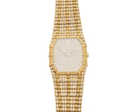 An 18ct gold diamond Audemars Piguet wristwatch, ref C12337, the full diamond set dial with bamboo bezel and similarly set fa