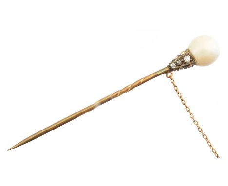 A pearl and diamond stickpin, the freshwater natural pearl with vari cut diamond surmount. Condition report: Verbal report 12