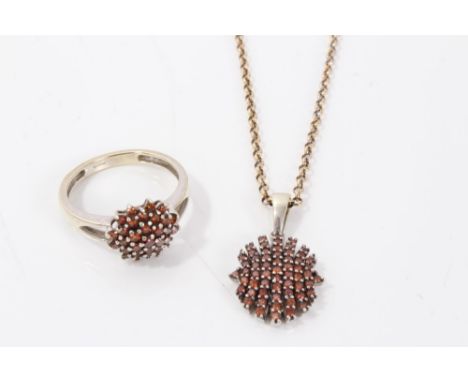 Gold (9ct) cognac diamond pendant on chain and matching ring, with certificate card and original receipts CONDITION REPORT To