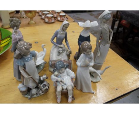 Five Lladro porcelain figures - including girl with doll in rocking chair, ladies with geese, etc, Nao porcelain figure - gir