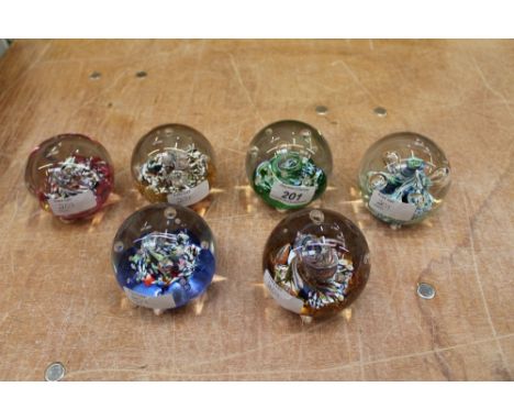 Six Caithness 'Myriad' 1978 glass paperweights, made by Oban Studios