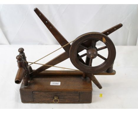 Vintage table-top bobbin winder with side-mounted arm and frame