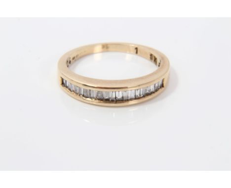 Gold (9ct) diamond half eternity ring with baguette cut diamonds in channel setting.  Ring size J CONDITION REPORT Weight 2.4