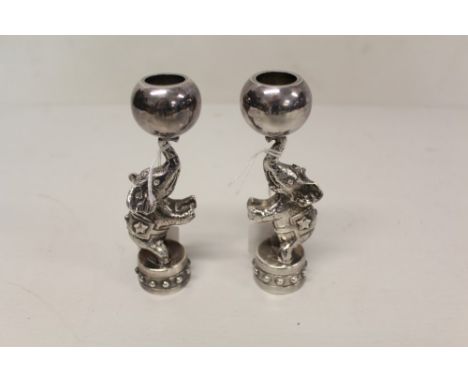 Pair novelty silver plated candlesticks, by Jean Boggio, modelled in the form of circus elephants, on a plinth, standing on r