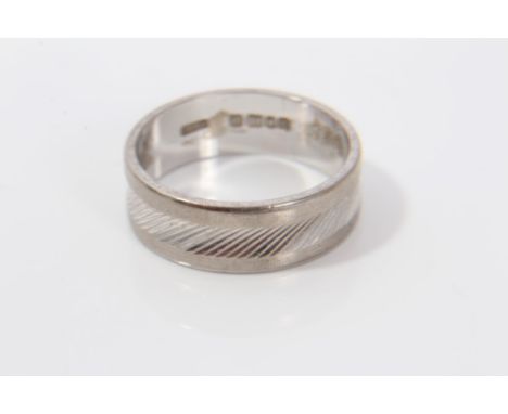 18ct white gold wedding ring with engraved design  CONDITION REPORT Total gross weight approximately 4.8 grams