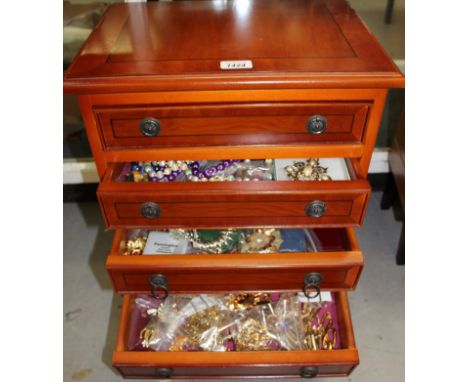 Four-drawer cabinet containing gilt metal jewellery, vintage brooches, beads, etc