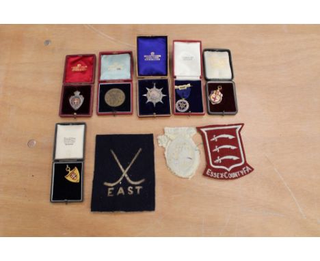 Two Colchester related gold (9ct) and enamel sporting fobs dated 1905 and 1912 and silver and other sporting medals and cloth