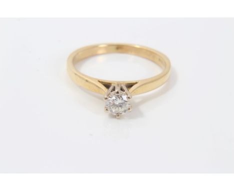 Gold (18ct) diamond single stone ring, estimated to weigh approximately 0.20 carats, in raised six-claw setting.  Ring size K