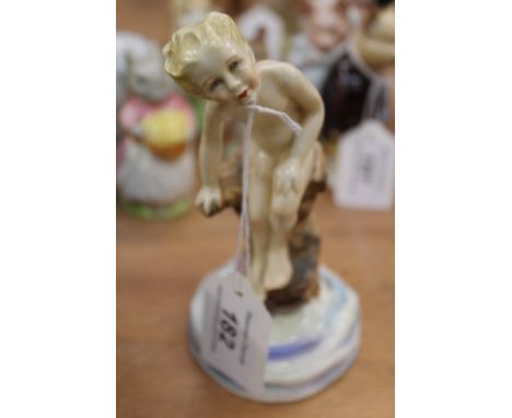 Royal Worcester figure - Water Baby, modelled by F. G. Doughty